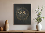 Gold wreath with "GOD IS WITHIN HER" text on dark canvas wall art.