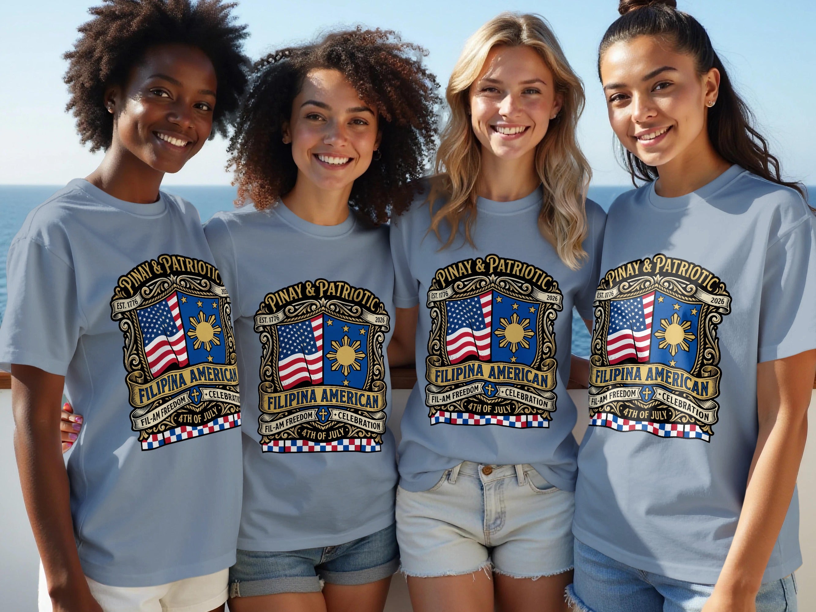 Four smiling women in gray t-shirts with "Pinay & Patriotic Filipina American" flag design.