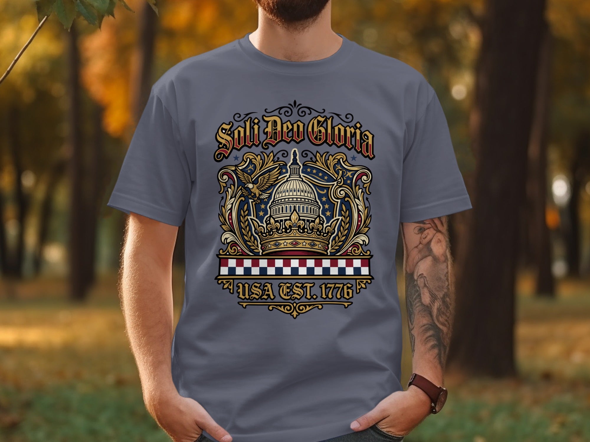 Gray t-shirt with "Soli Deo Gloria USA Est. 1776" design featuring a crown and eagle.