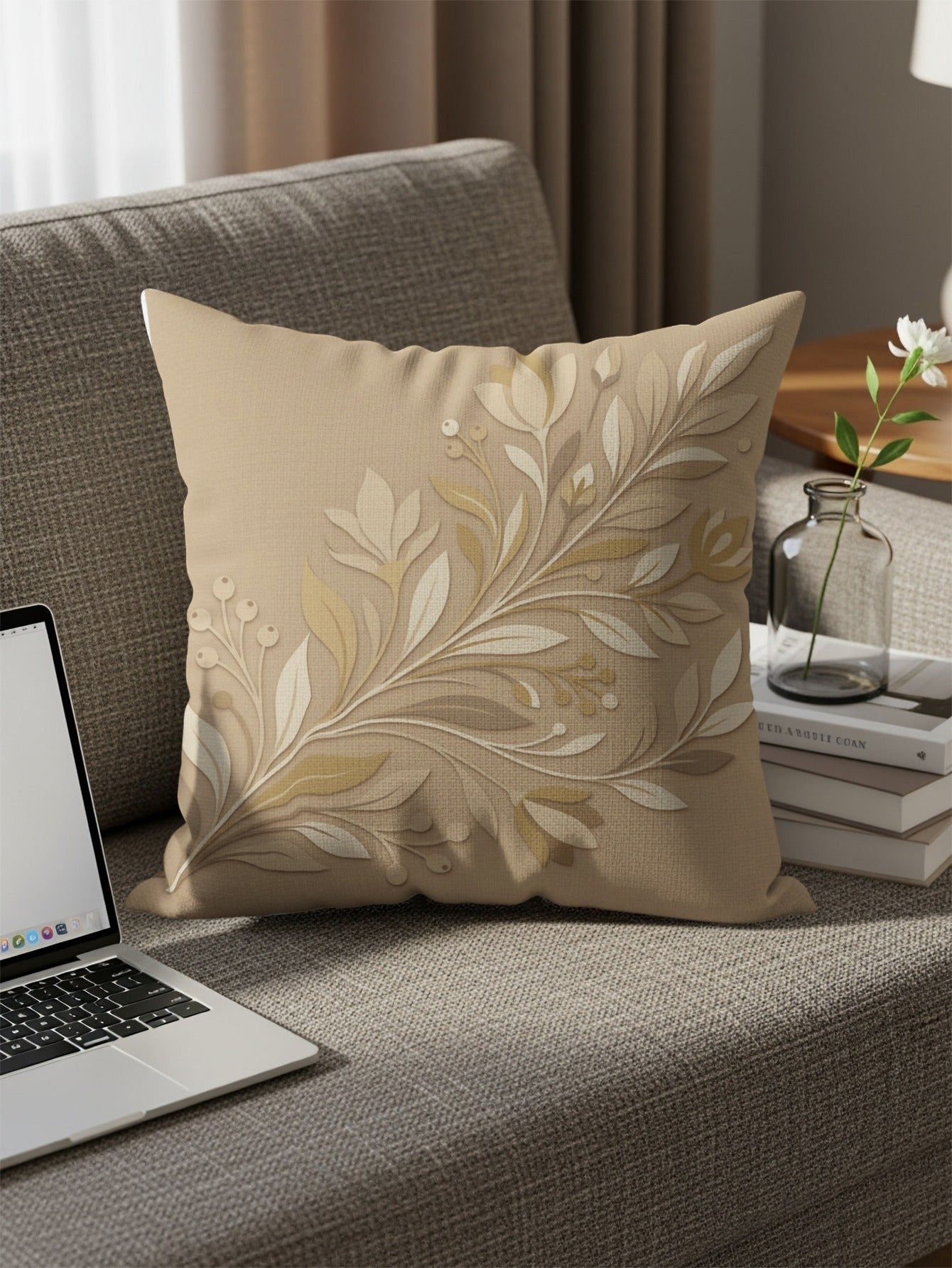 Beige decorative pillow with floral embossed design on sofa.