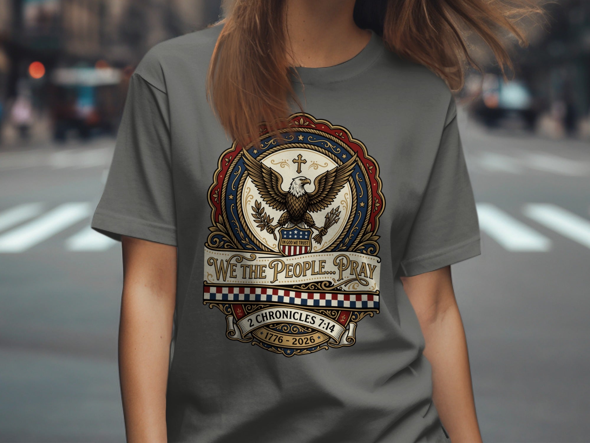 T-shirt with eagle, patriotic emblem, and "WE THE PEOPLE... PRAY" text.