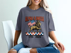 T-shirt with lion wearing crown, holding American flag, "Alpha & Omega" text.