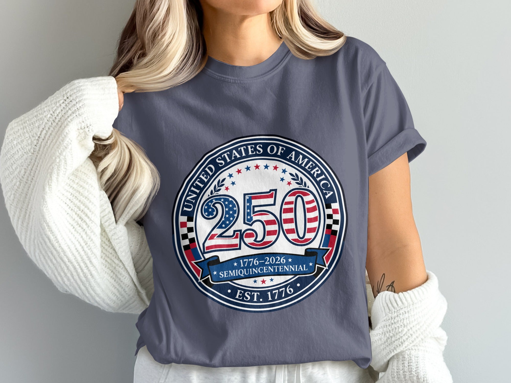 "250" semicentennial 1776-2026 United States of America logo on a gray t-shirt.