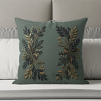 Green throw pillow with gold and dark green botanical design.