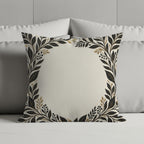 Square decorative pillow with floral black and gold leaf border.
