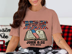 T-shirt with open book, American flag, and "The Truth Shall Set You Free John 8:32" text.