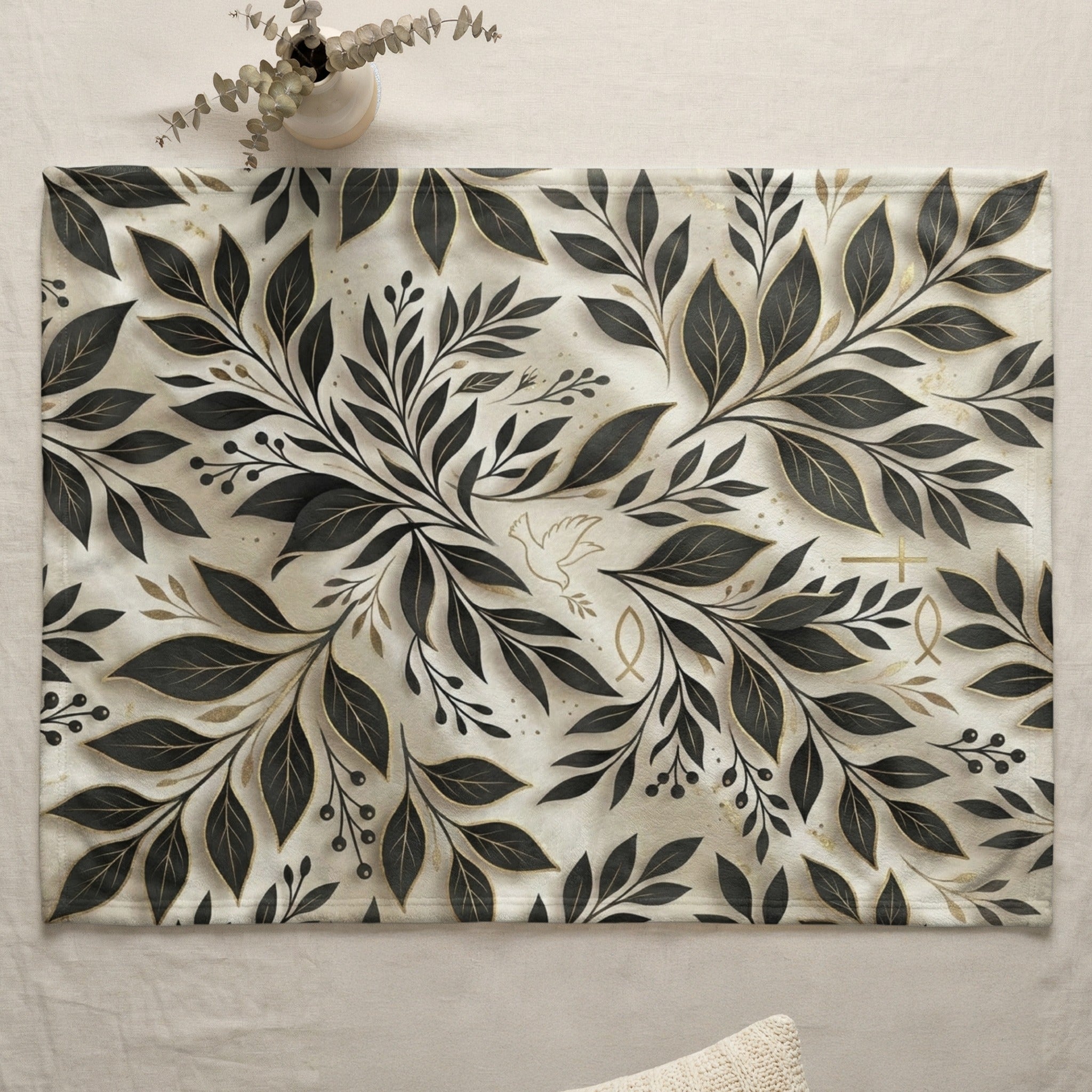 Cream placemat with black leaf and vine pattern, featuring subtle cross and dove symbols.