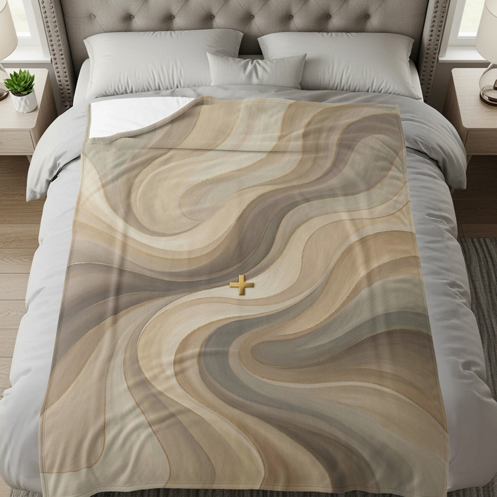 Abstract beige and brown wavy pattern with a golden cross on a bed.