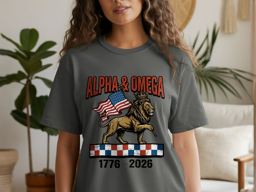 Men's grey t-shirt with lion holding American flag, "ALPHA & OMEGA", and dates.