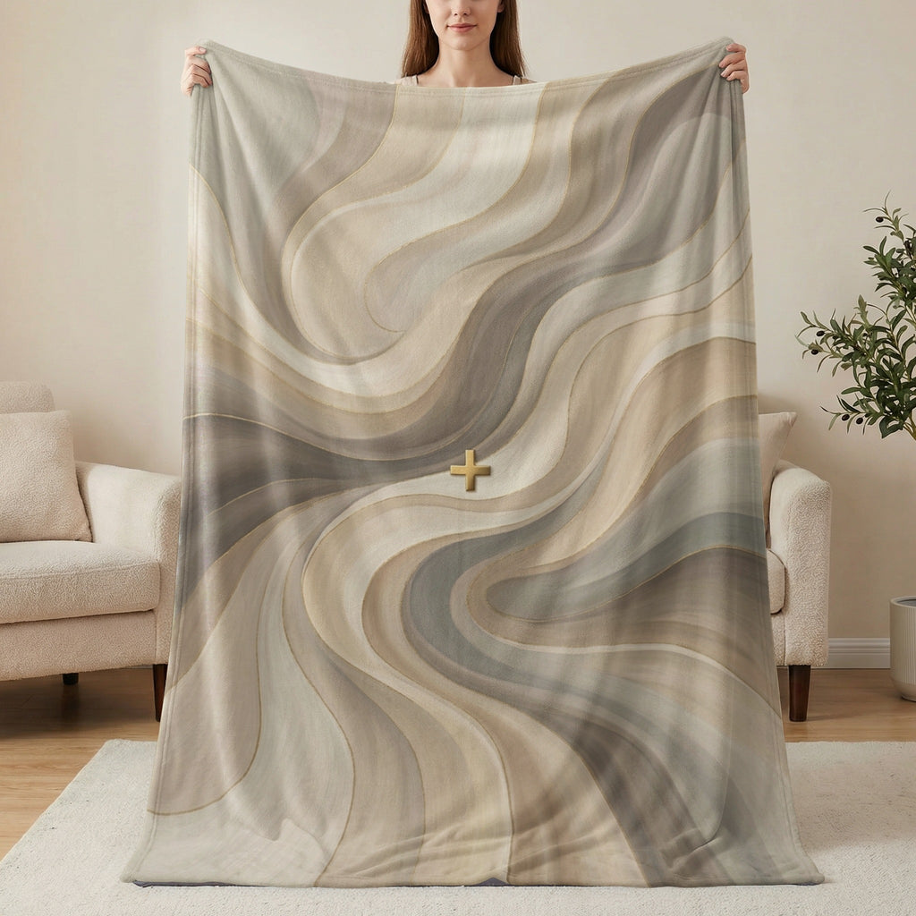 Swirled brown, beige, and grey abstract pattern blanket with golden plus sign.