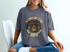 T-shirt with "Proclaim Liberty" emblem featuring the Liberty Bell, flags, and dates 1776-2026.