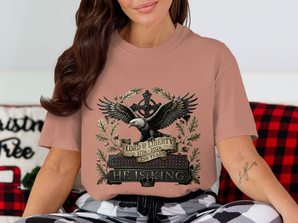Eagle with outstretched wings and "Lord of Liberty 1776-2026" text on t-shirt.