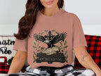 Eagle with outstretched wings and "Lord of Liberty 1776-2026" text on t-shirt.