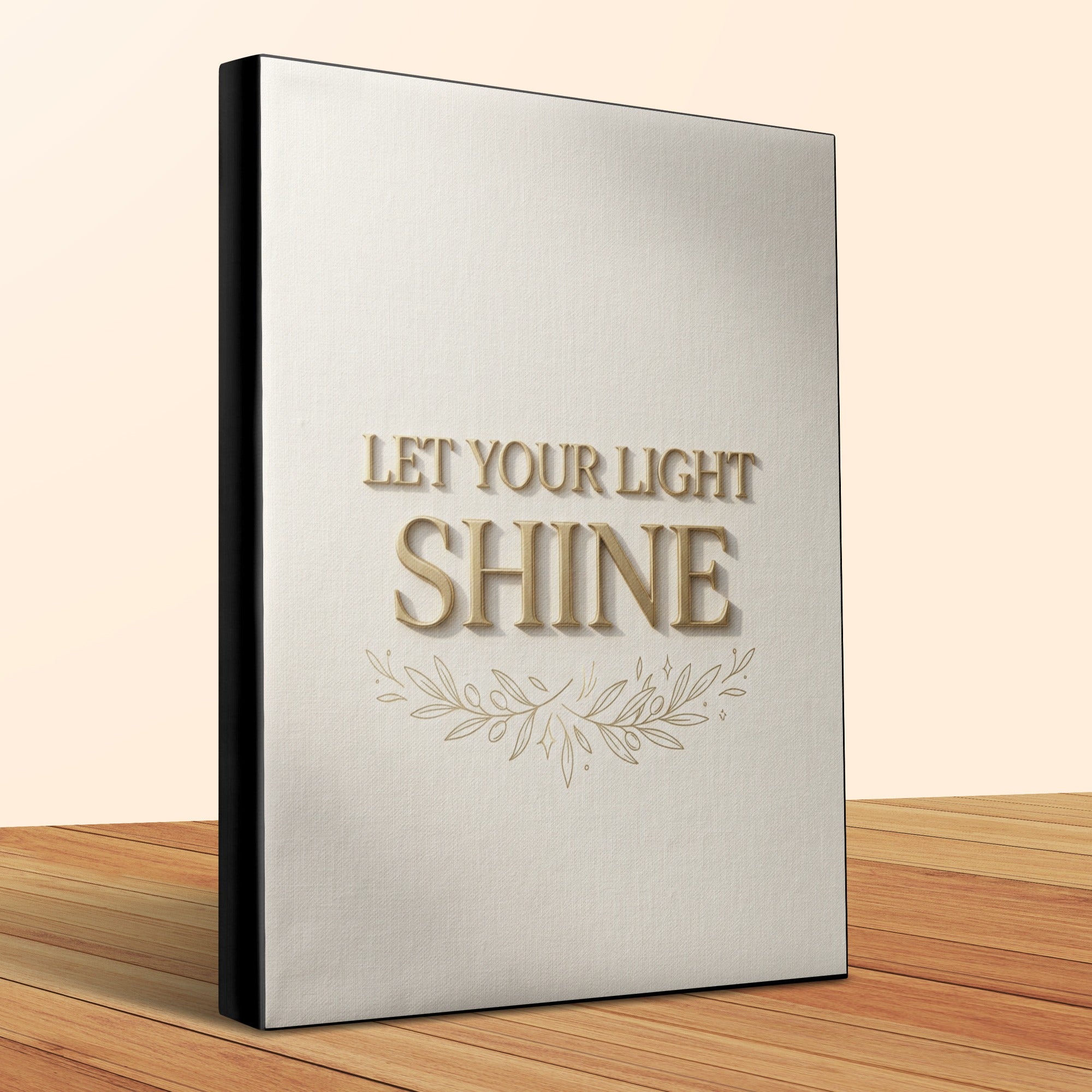 Canvas art with "LET YOUR LIGHT SHINE" in gold lettering and an olive branch design.