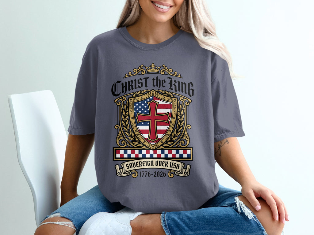 Gray t-shirt with "Christ the King" shield design and American flag.