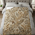 Textured blanket with embossed floral, wheat, and cross motifs.