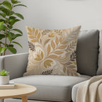 Throw pillow with neutral floral pattern on a gray sofa.