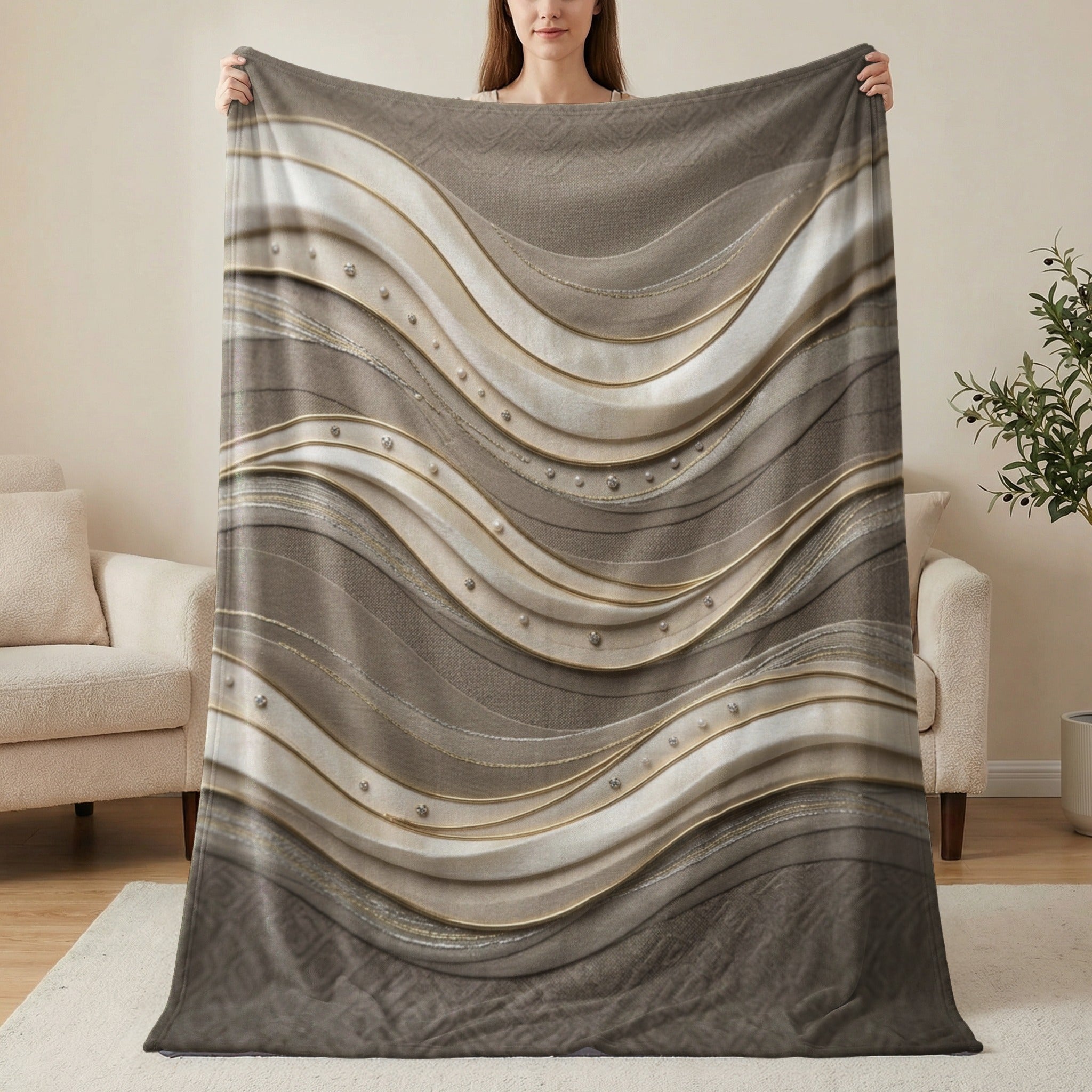 Textured brown and cream blanket with wavy lines and embellishments.
