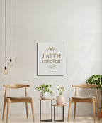 Canvas art with "FAITH OVER FEAR" and "ISAIAH 41:10" text.