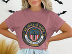 T-shirt with a circular graphic featuring a cross, stars, and "Rejoice in Hope Patient in Tribulation Romans 12:12".