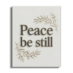 Canvas art with "Peace be still" text and botanical sprigs.